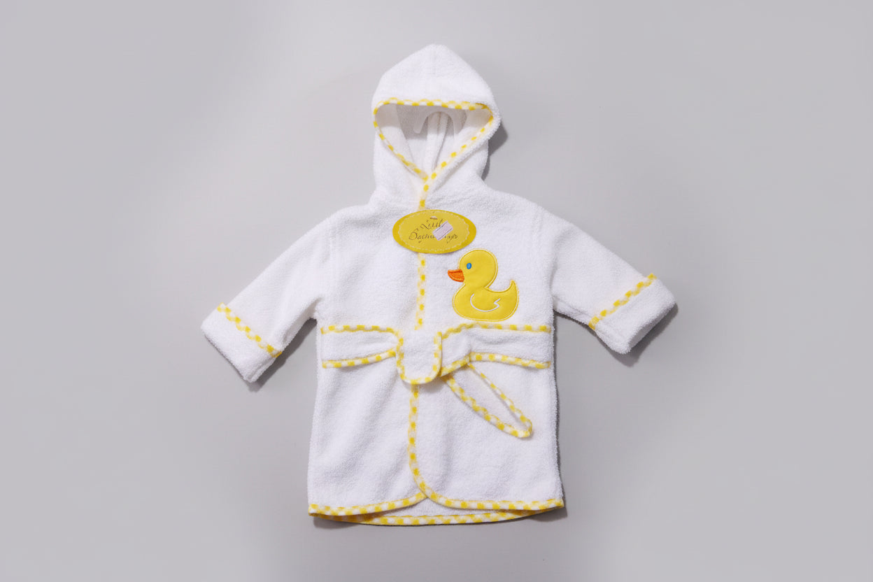 White baby robe with yellow accents and a duck design on a green textured background