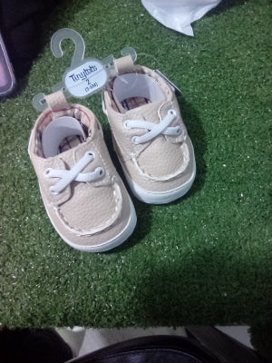Tan baby shoes